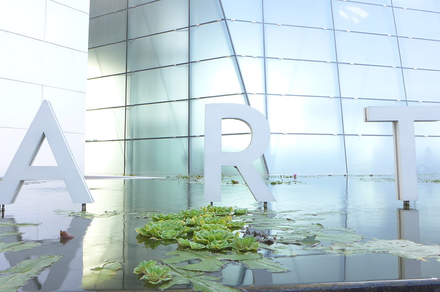 Modern Art Museum Architecture with Water Reflection