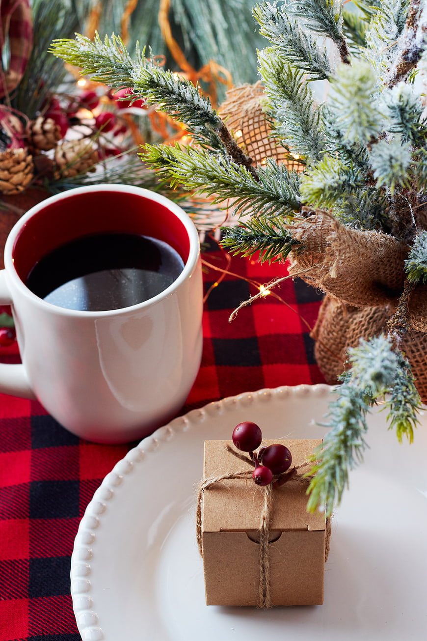 Festive Christmas Coffee Mug and Gift Box on Plaid