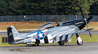 Vintage P-51 Mustang Fighter Plane on Runway