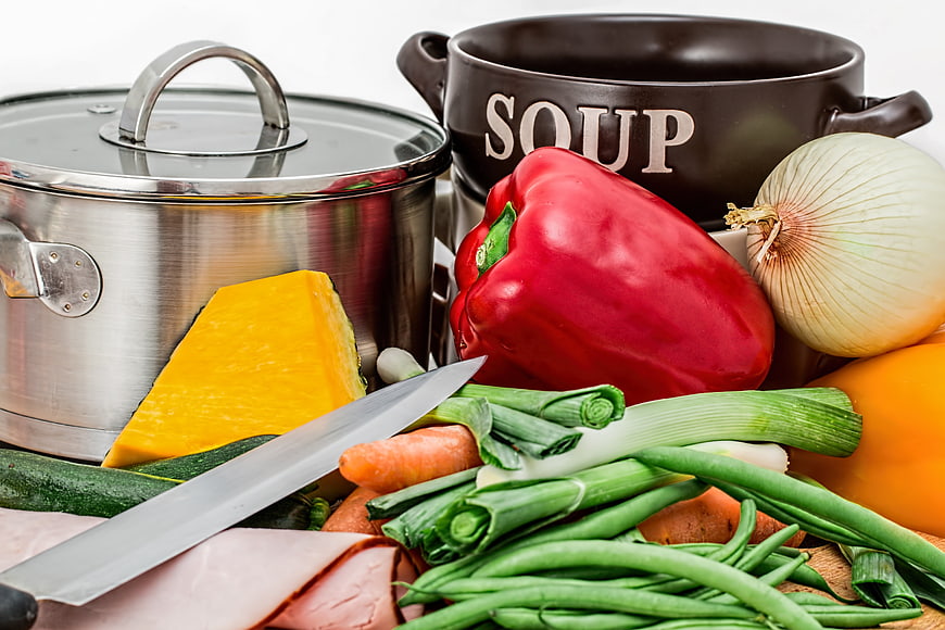 Fresh vegetables and soup pot ingredients for cooking
