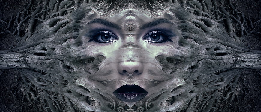Surreal fantasy portrait of a woman's face merging with gnarled tree roots