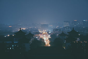 Night View of Traditional Chinese Architecture and City Lights