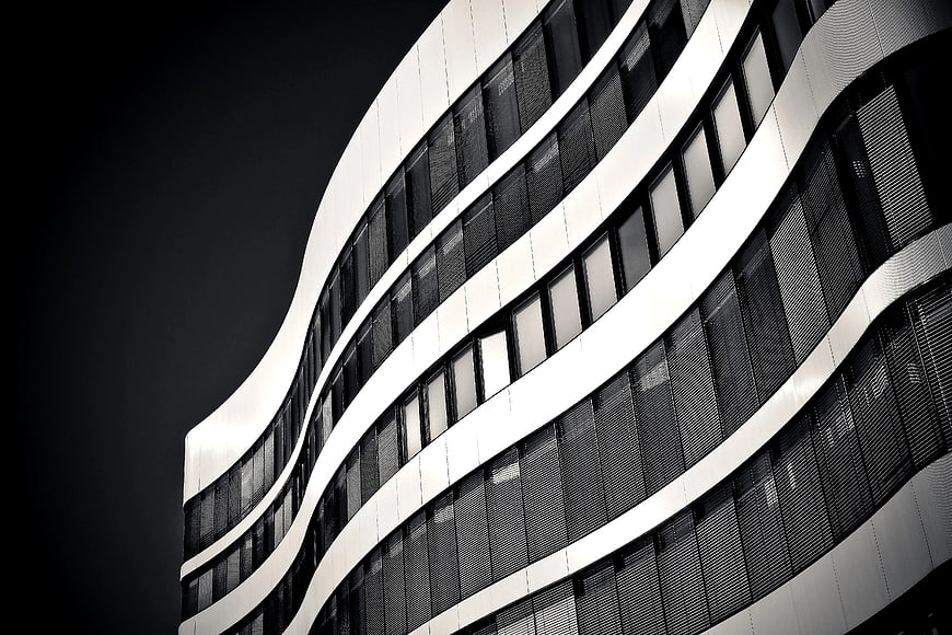 Modern Curved Office Building Architecture in Black and White