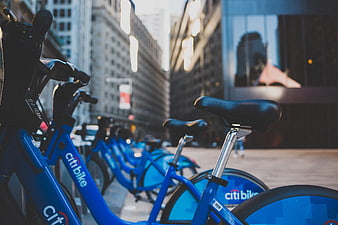 Blue Citi Bikes Parked in Urban City Street