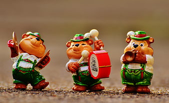 Three Ceramic Bear Figurines Playing Musical Instruments