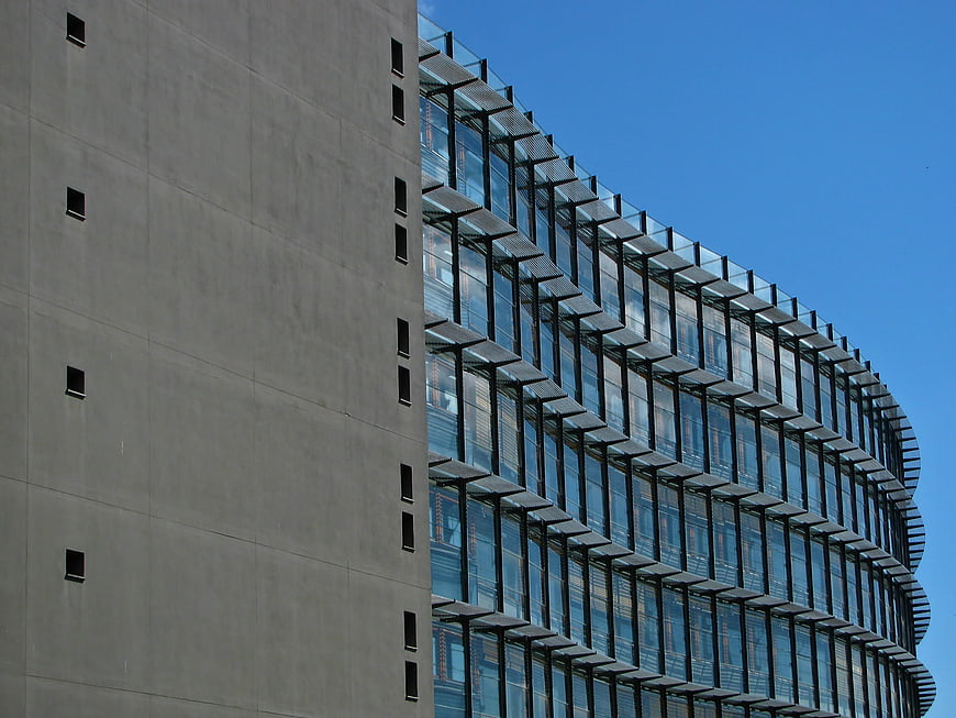 Modern Curved Glass Architecture Facade With Concrete Wall Detail