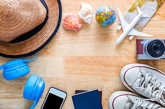 Summer Travel Accessories Flat Lay on Wooden Background