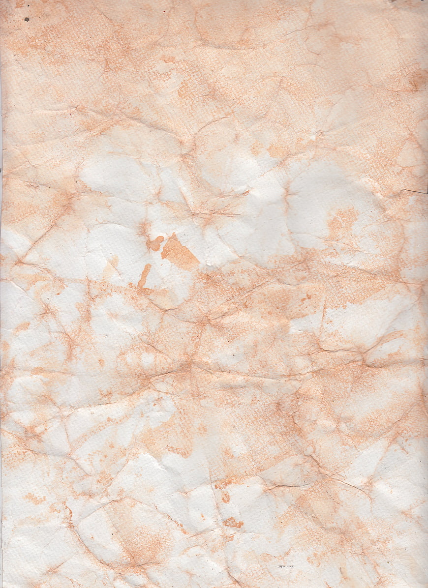 Crumpled beige paper texture with vintage stains