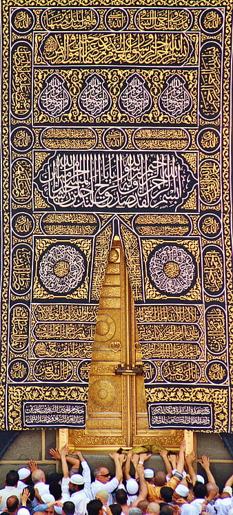 Pilgrims Praying at the Golden Door of the Kaaba in Mecca