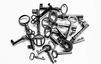 Vintage Antique Skeleton Keys Pile on White Background