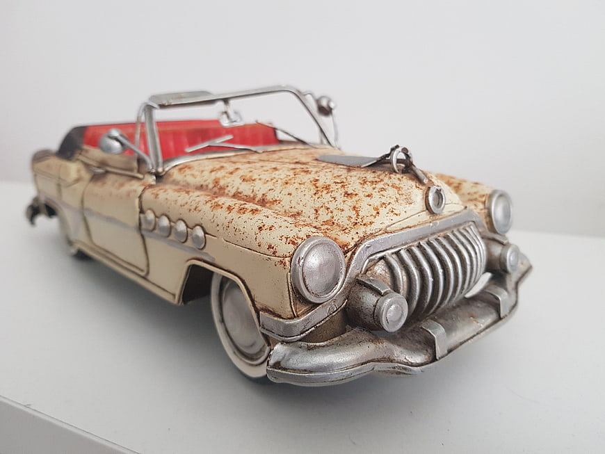 Vintage Rusty Tin Toy Car Model