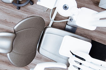 Top View of Empty Modern Dental Chair and Equipment