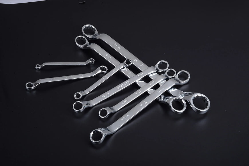 Set of Chrome Combination Wrenches on Black Background