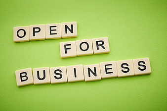 Open for Business Scrabble Tiles on Green Background