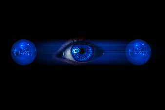 Human Eye With Blue Quantum Physics Overlay