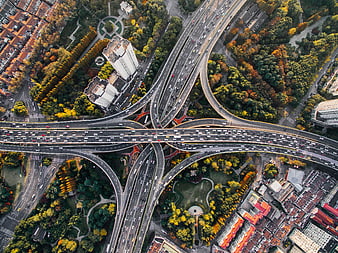 Aerial View of Busy Highway Interchange in Autumn City