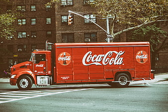 Red Coca-Cola Delivery Truck on City Street