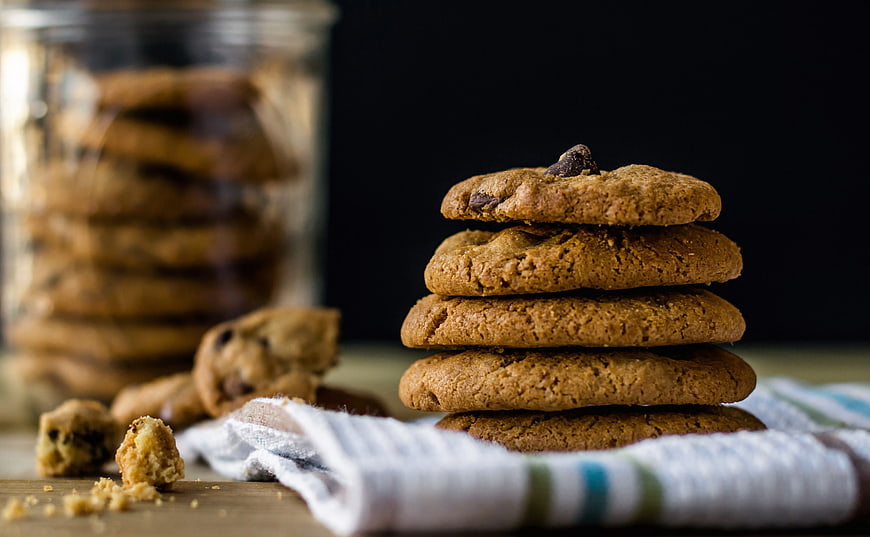 Stack of Chocolate Chip Cookies on Wooden Table