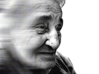 Close-up portrait of elderly woman with halftone texture