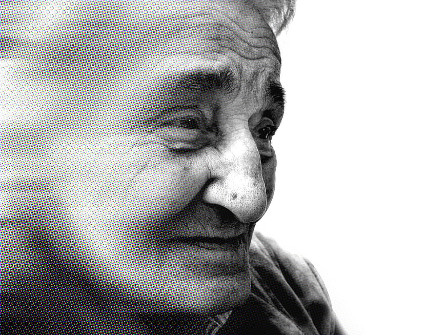 Close-up portrait of elderly woman with halftone texture