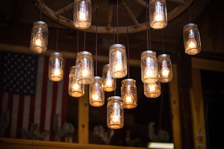 Rustic Mason Jar Chandelier with American Flag Background