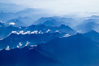 Majestic Blue Mountain Ranges with Atmospheric Perspective