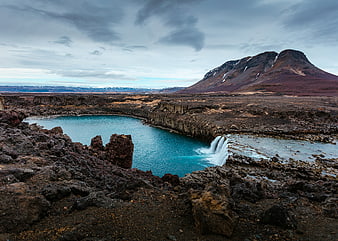 Stunning Blue Waterfall in Icelandic Highland Landscape