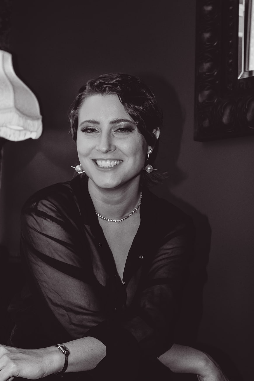 Smiling woman in black and white portrait with vintage style
