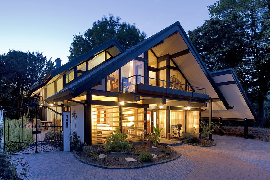 Modern Timber Frame House Exterior at Dusk