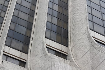Abstract Gray High-rise Building Facade with Curved Tiles