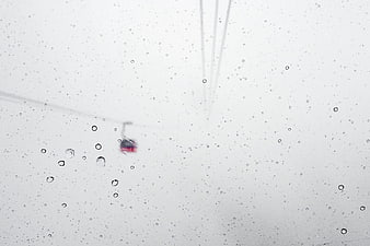 Gondola Cable and Snowflakes in Heavy Blizzard