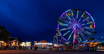 Illuminated Ferris Wheel At Night State Fair
