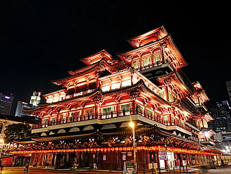 Illuminated Thian Hock Keng Temple at Night in Singapore