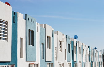 Modern Blue and White Apartment Buildings Row