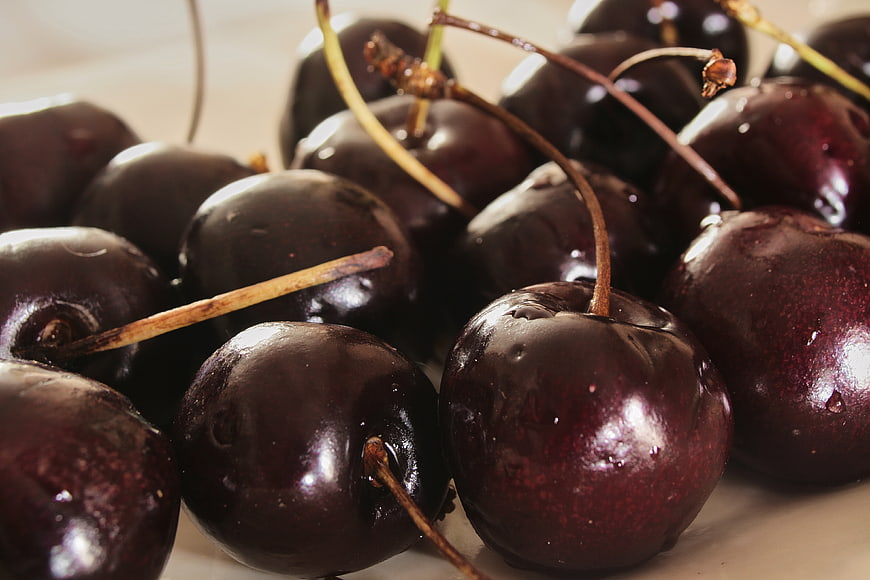 Close-up of Fresh Dark Red Cherries with Stems