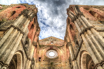 Low angle view of San Galgano Abbey ruins in Tuscany