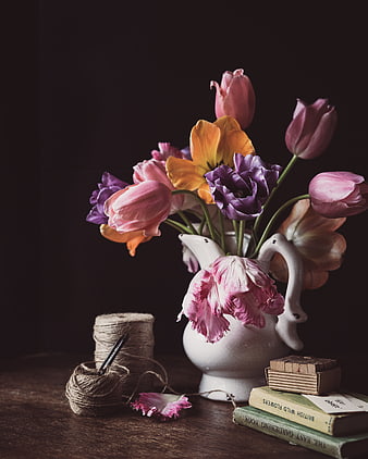 Colorful Tulip Bouquet in White Ceramic Pitcher with Books