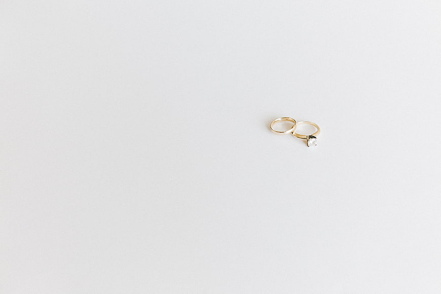 Minimalist Gold Wedding Rings on White Background