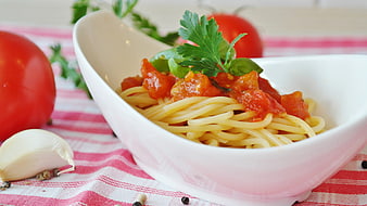 Spaghetti with Tomato Sauce in White Bowl on Checkered Cloth
