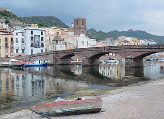 Historic stone bridge over river in Oristano, Sardinia