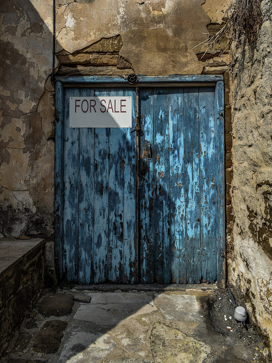 Weathered Blue Wooden Door with For Sale Sign