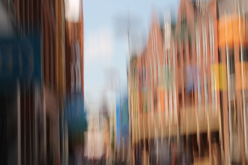 Abstract motion blur of colorful canal houses in Groningen