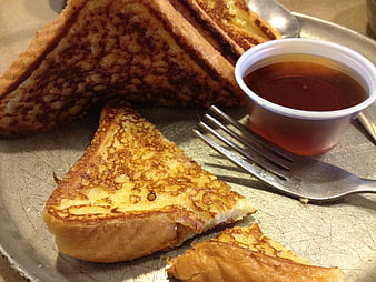 Golden French Toast Triangles With Syrup On Metal Plate