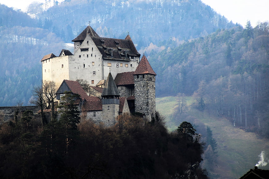 Medieval Castle on Misty Mountain Hillside