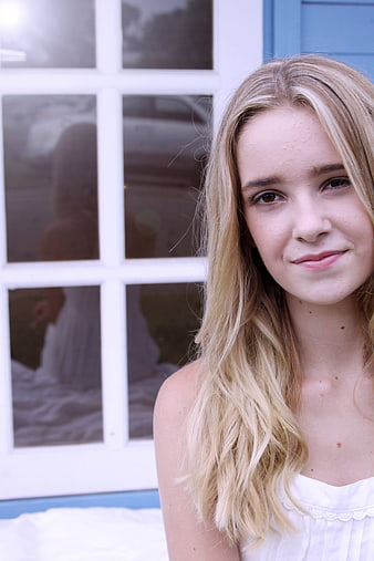Close-up Portrait of Blonde Woman with Natural Skin Texture