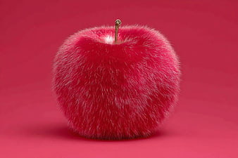 Surreal Fluffy Red Apple on Pink Background