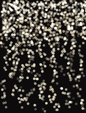 Gold and Silver Bokeh Lights on Black Background