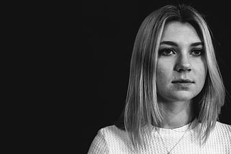 Black and white portrait of a young woman with copy space