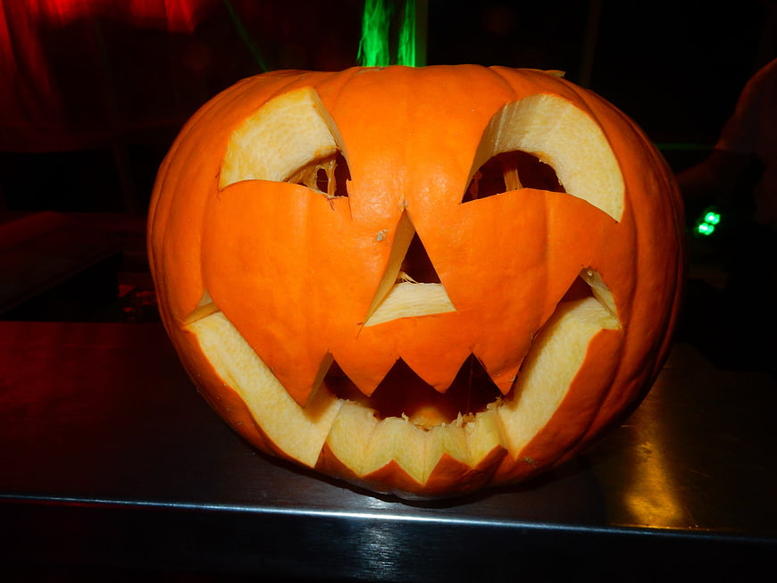 Carved Halloween Jack-O'-Lantern with Glowing Face