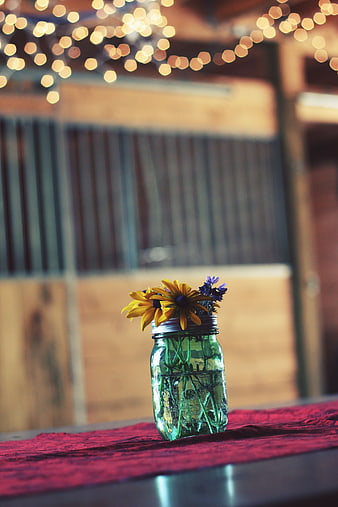 Rustic Mason Jar Centerpiece with Wildflowers and Bokeh Lights